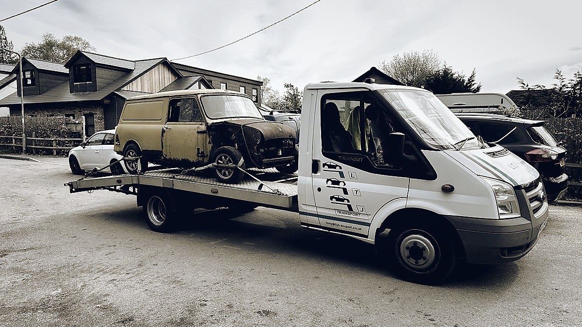 Classic Mini Van restoration project collected on flatbed by LTJ Transport salvage specialists